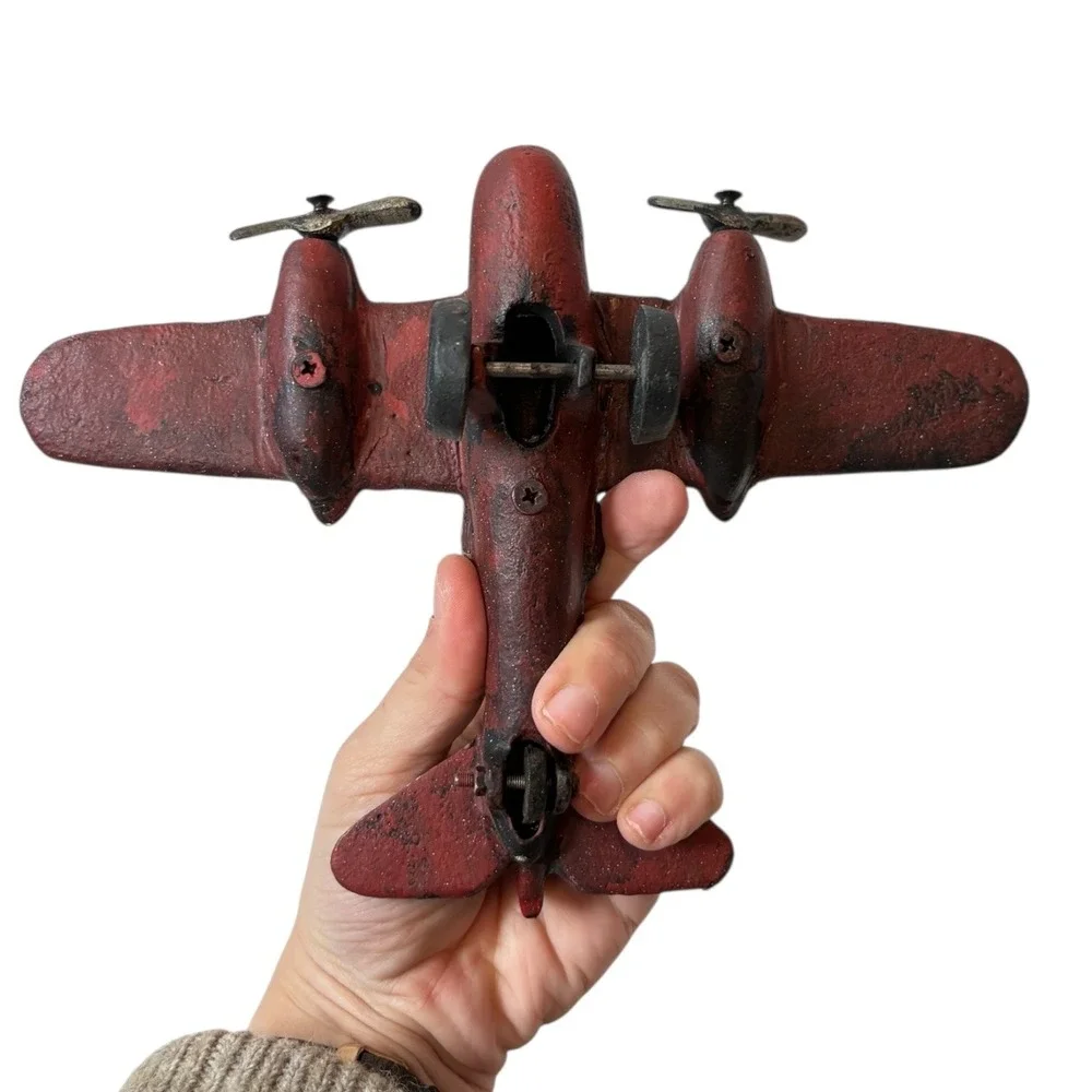 Vintage Cast Iron WWII Toy Airplane Bomber B22 Red Silver Twin Propellers Driven